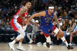 爱游戏入口-南韩男篮完胜灰熊，约基奇统治全场